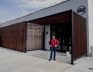 Scott Plank in front of the hall cp