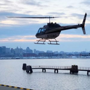 Helicopter taking off in the morning from heliport in Baltimore's waterfront.