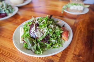 Atwater's leafy green salad with apples, located in Belvedere Square.